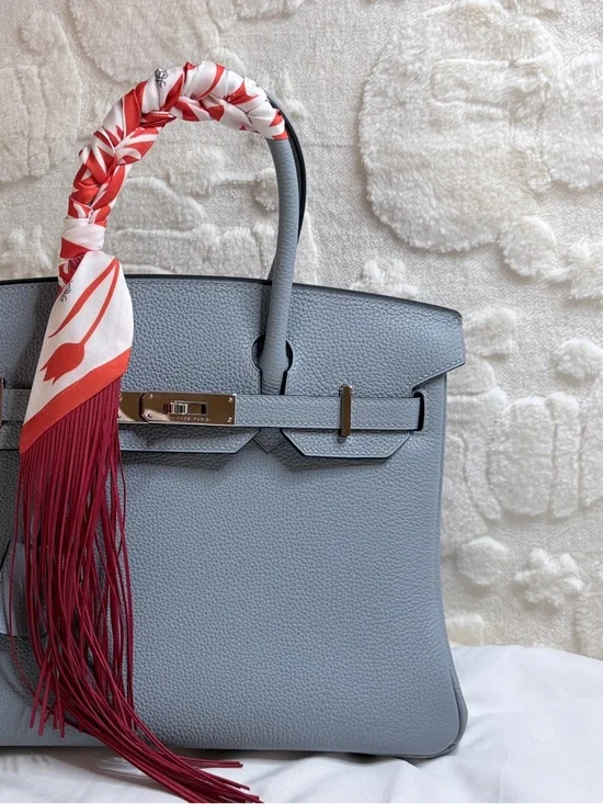 Trendy Fringe Handbag Wrap with Orange Fringe and Bold White Flower Pattern - Picture 5 of 10